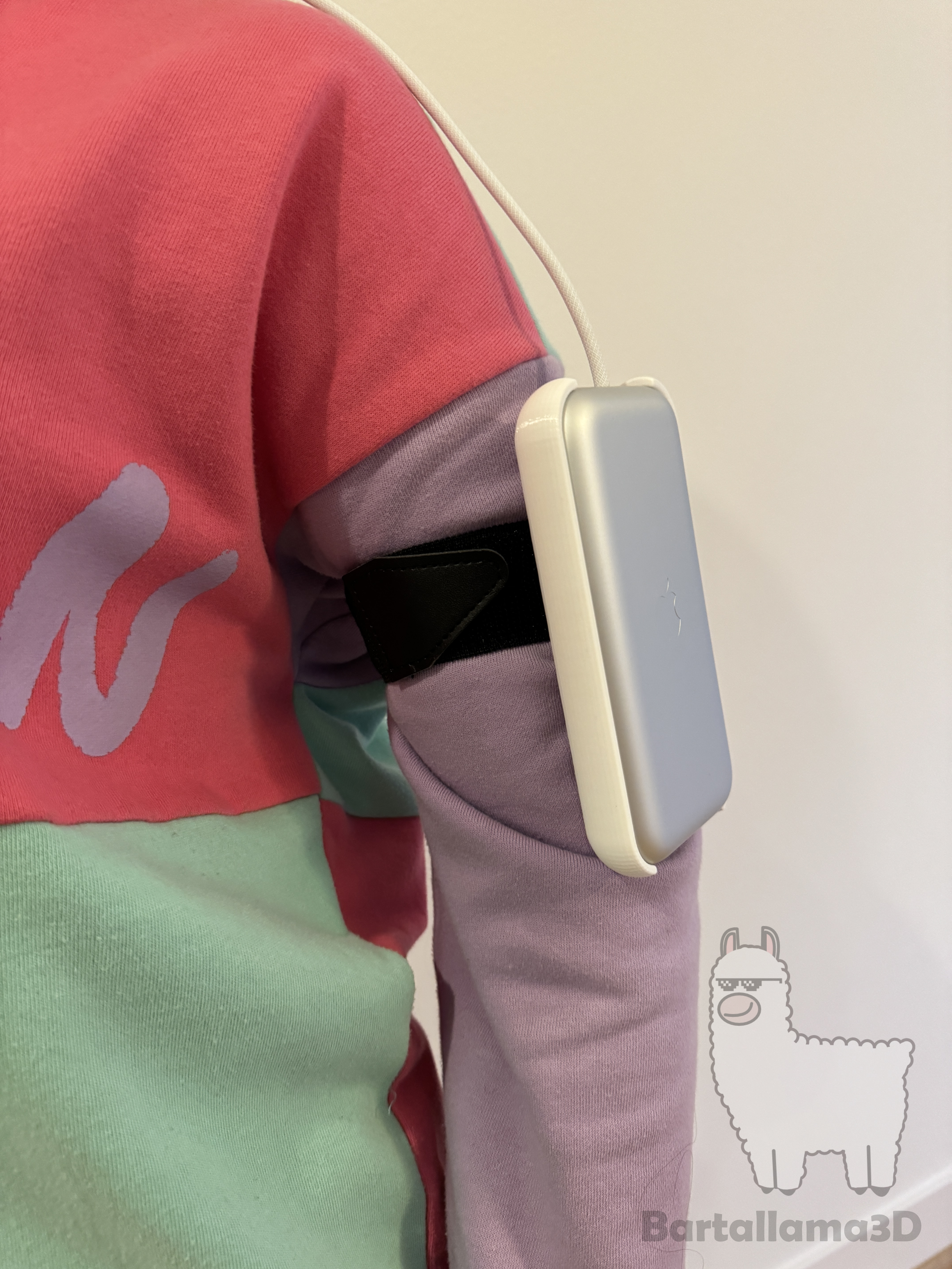 A picture of the unit being worn on the left arm