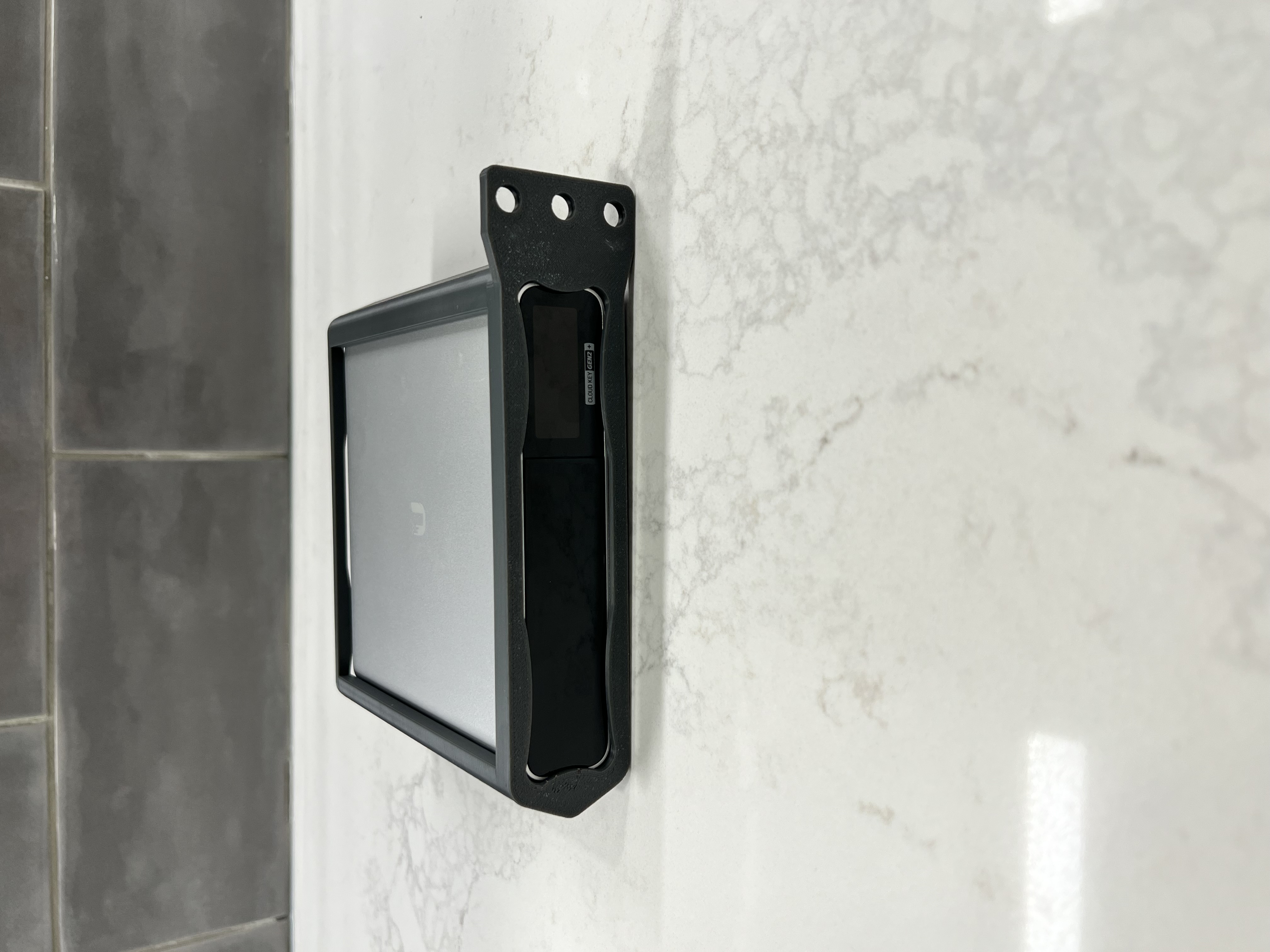 A picture of the assembled unit with a Cloud Key Gen2 Plus Installed