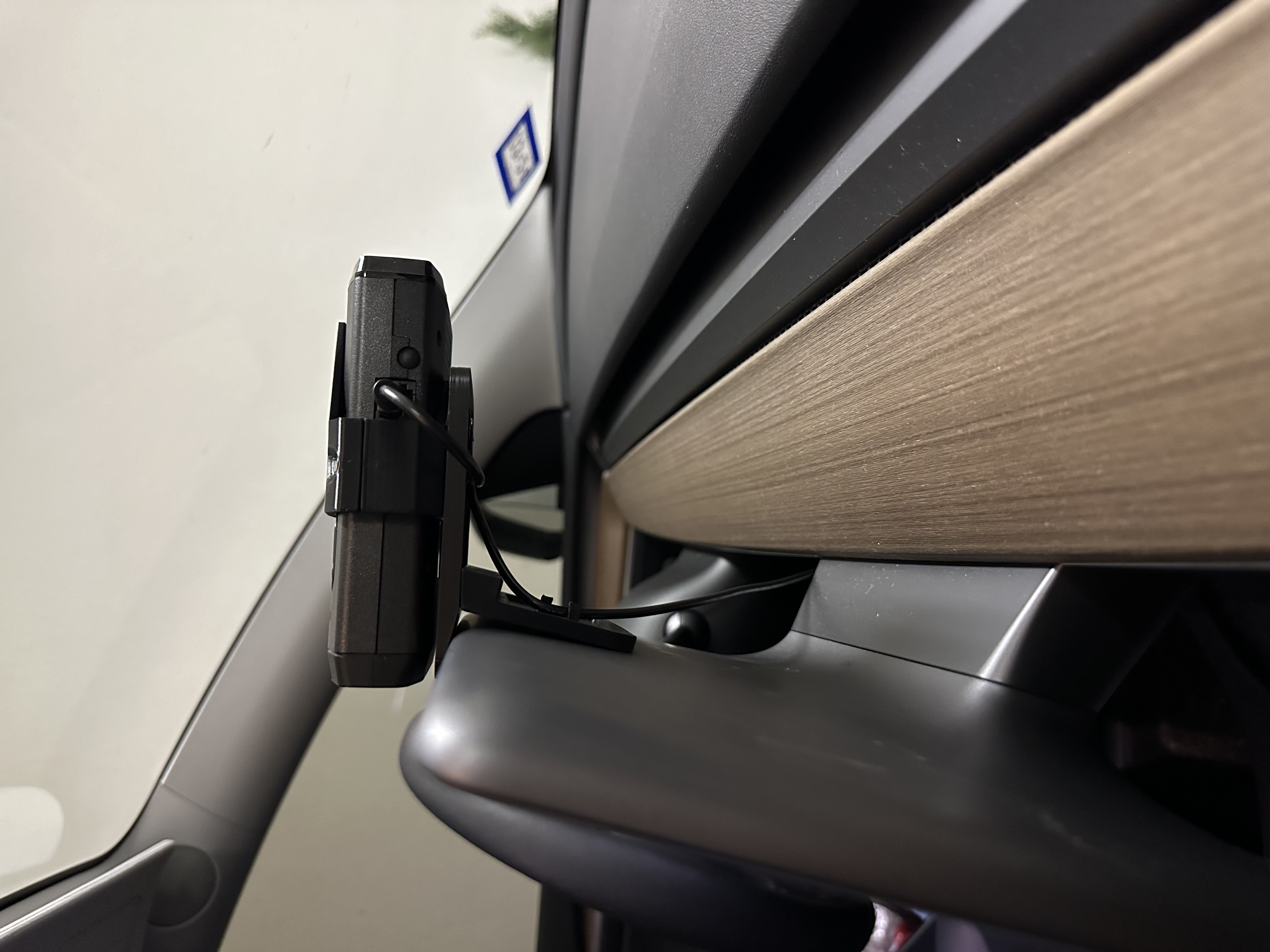 Side view of the radar unit mounted on the center screen of a Tesla