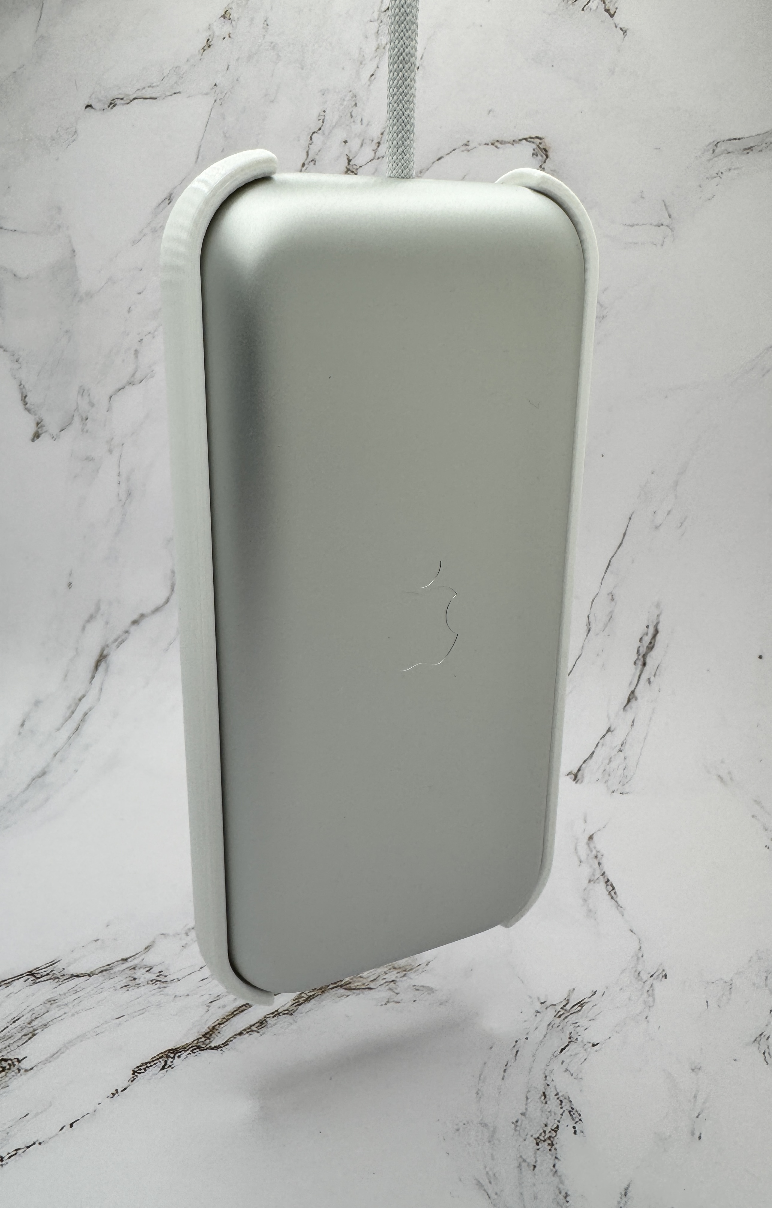 A picture of the battery holder, with battery installed, front view